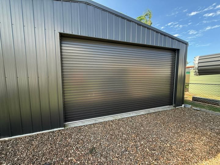Charcoal roller door fitted to a Gold Coast shed by Garage Door Doctor